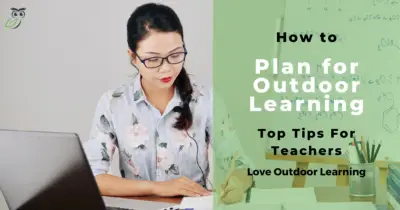 A teacher planning at a desk indoors